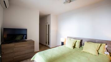 4 slaapkamers, een strijkplank/strijkijzer, wifi, beddengoed