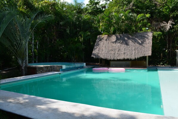 Outdoor pool, open 8:00 AM to 10:00 PM, free cabanas