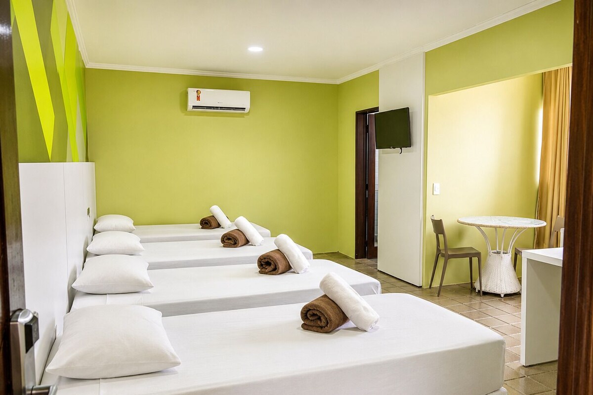 Deluxe Quadruple Room | Hypo-allergenic bedding, desk, laptop workspace, blackout curtains