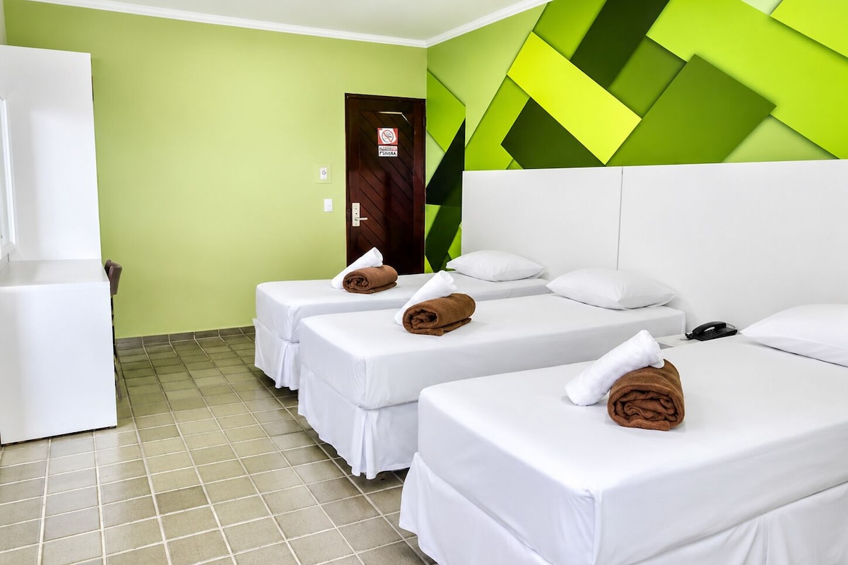 Deluxe Triple Room | Hypo-allergenic bedding, desk, laptop workspace, blackout curtains