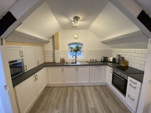 Appartement, salle de bains attenante | Cuisine partagée