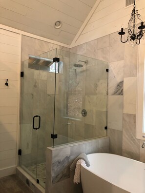 Bathtub, hair dryer, towels, soap