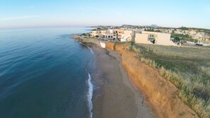 On the beach, sun loungers