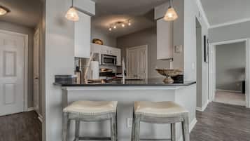 Premium Apartment, 2 Bedrooms, Balcony, Pool View | Private kitchen | Full-size fridge, microwave, oven, stovetop