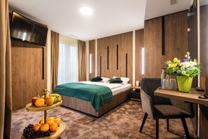 Literie hypoallergénique, minibar, coffres-forts dans les chambres