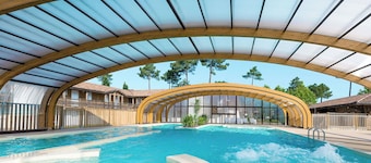 Hyggelig lejlighed for 4 personer med pool, WIFI, TV, terrasse og kæledyr tilladt