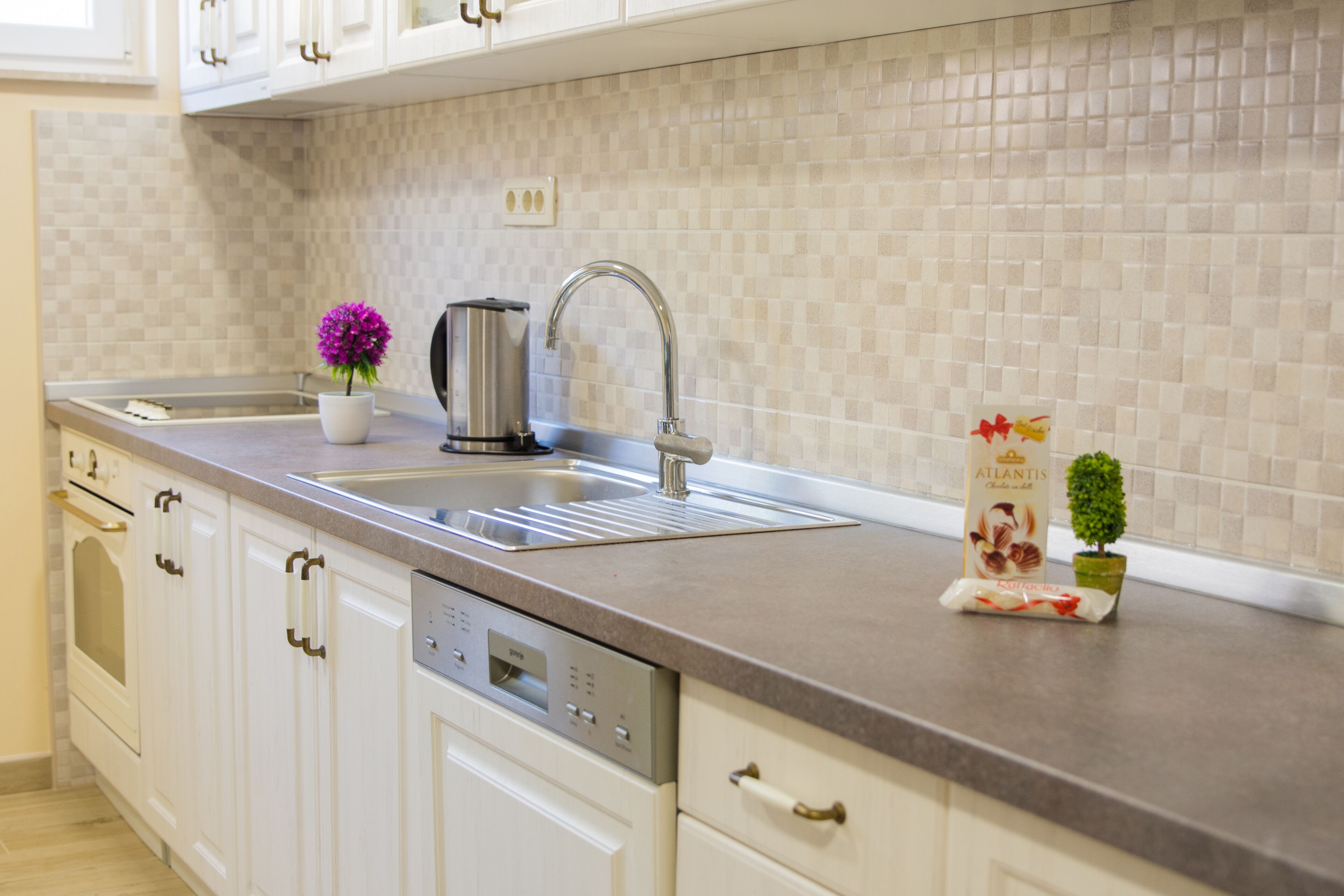 Deluxe Apartment, 2 Bedrooms | Private kitchen | Full-size fridge, oven, stovetop, coffee/tea maker