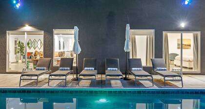 Four bedroom suites, private pool, spa & gourmet kitchen on .25 acre!