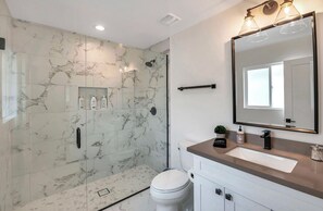 Hair dryer, towels, soap, shampoo