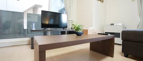 Appartement | Coin séjour | Télévision à écran plat