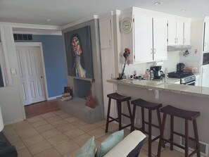 Fridge, microwave, dishwasher, cookware/dishes/utensils