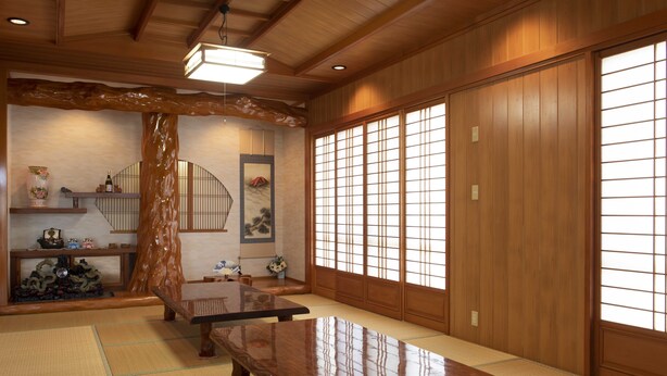 Une pièce de style japonais traditionnel, avec un sol recouvert de tatamis, des paravents en papier de riz (shoji) et une petite table basse.