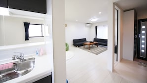 Private Vacation Home | Living area | Flat-screen TV - Neyagawa Station House (Neyagawa)