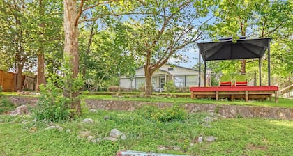 Darling cottage on the Blanco River. Minutes from downtown Wimberley!