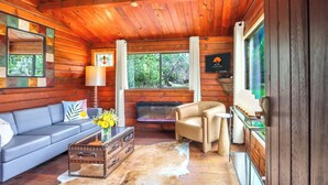 Living area - Canyon Vista I Romantic, hot tub, log cabin (Wimberley)