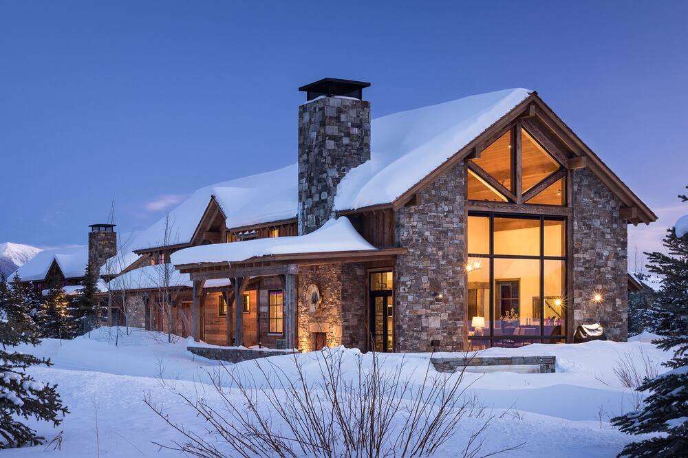 Luxury lodge at the base of Jackson Hole Mountain Resort with ski shuttle.