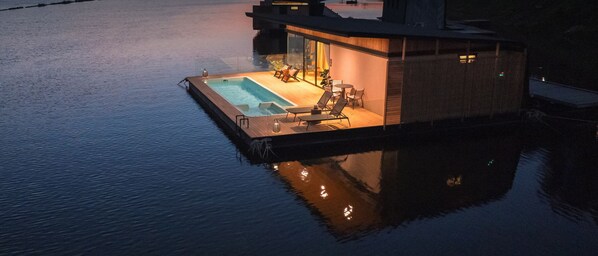 A floating house with a swimming pool and outdoor seating area. - Z9 Resort (Si Sawat)