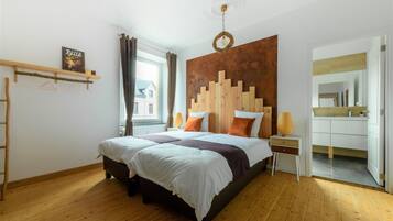 Individually decorated, laptop workspace, iron/ironing board