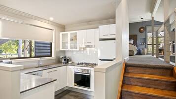 Full-sized fridge, microwave, oven, dishwasher