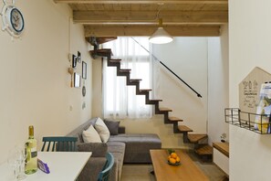 Eenvoudig appartement | Woonruimte | Een televisie, Netflix en streamingdiensten