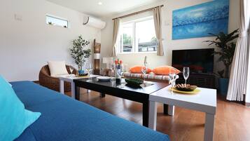 Casa (Kahoo) | Área de estar | TV de tela plana