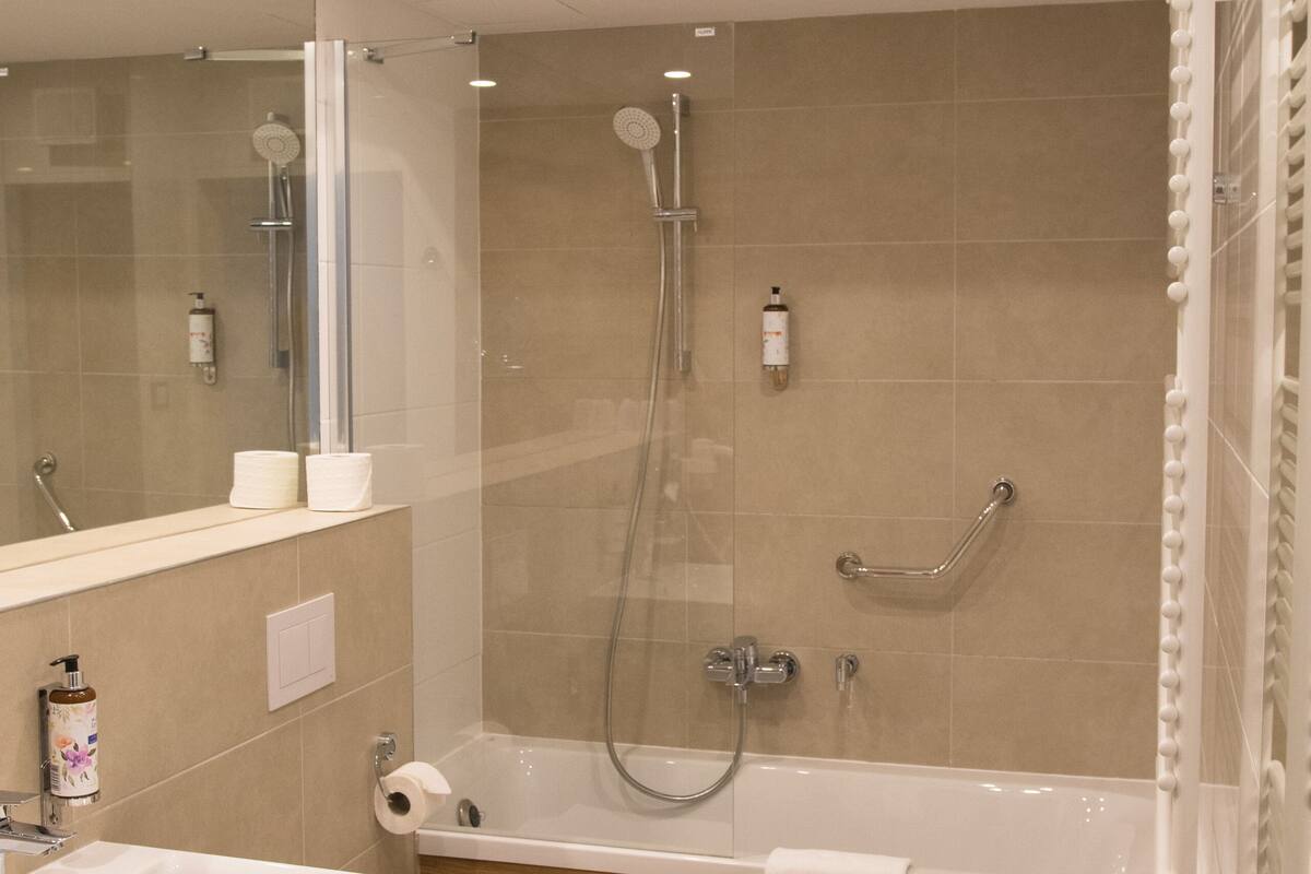 superior room (king) | bathroom | designer toiletries, hair dryer, bathrobes, slippers