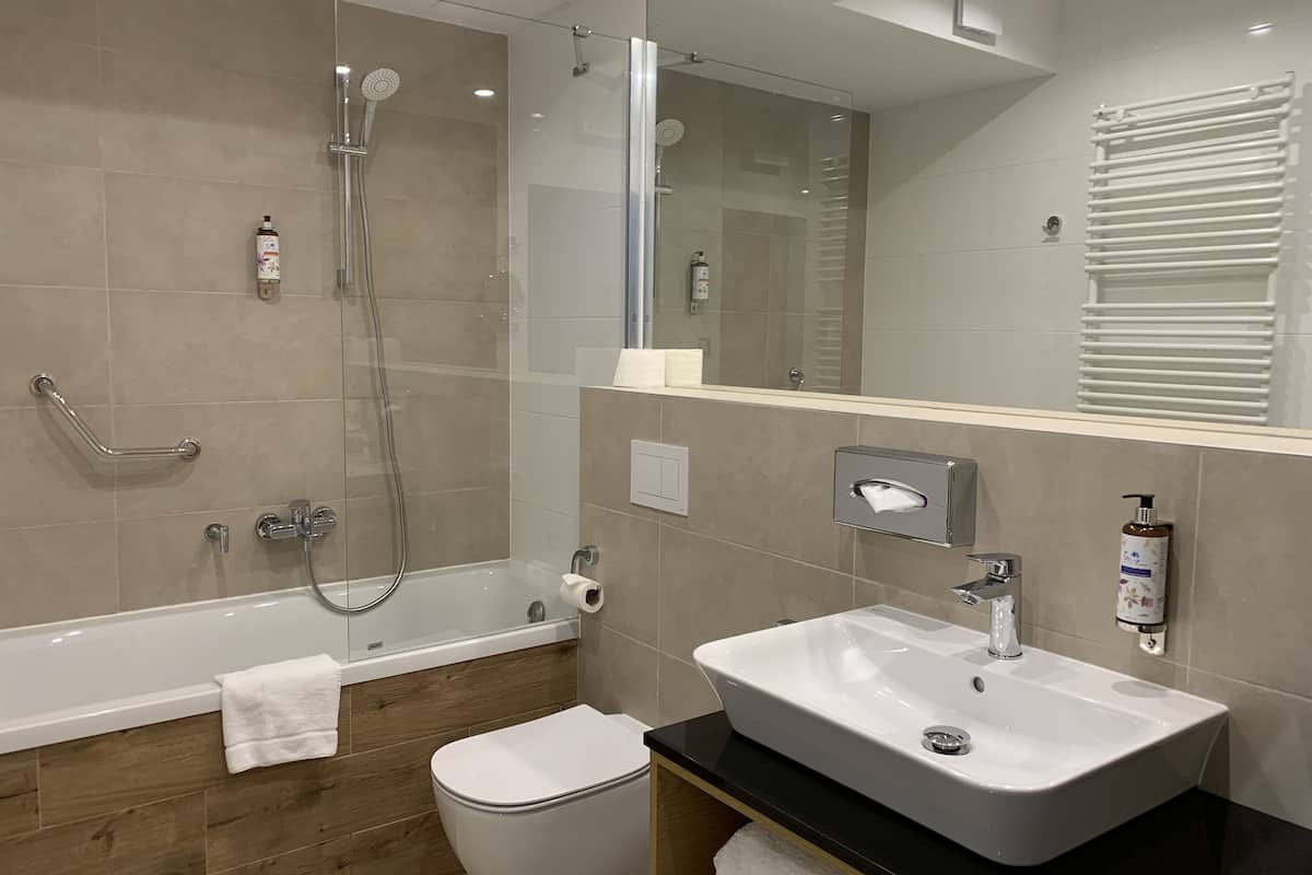 superior twin room | bathroom | designer toiletries, hair dryer, bathrobes, slippers