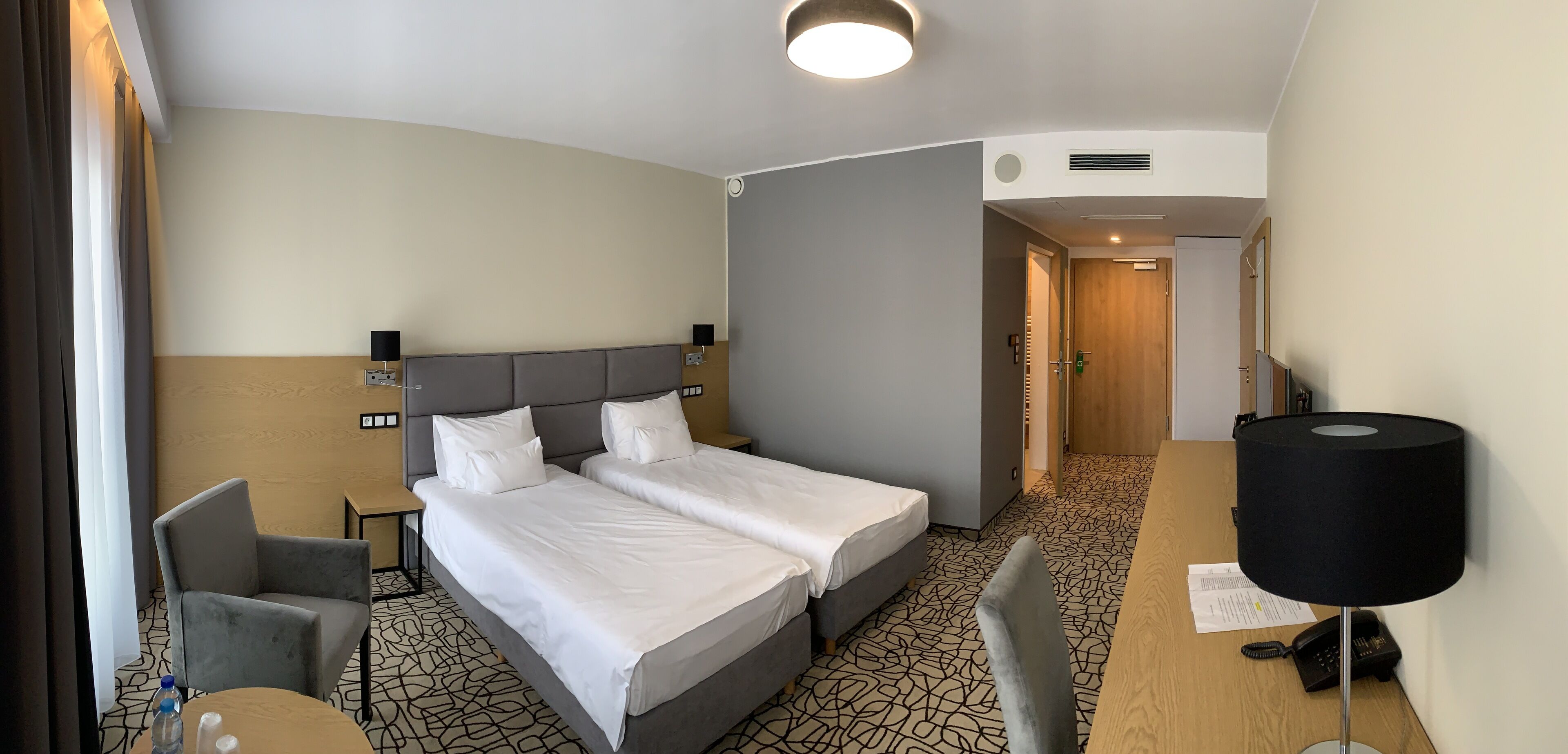 standard twin room | living area | smart tv