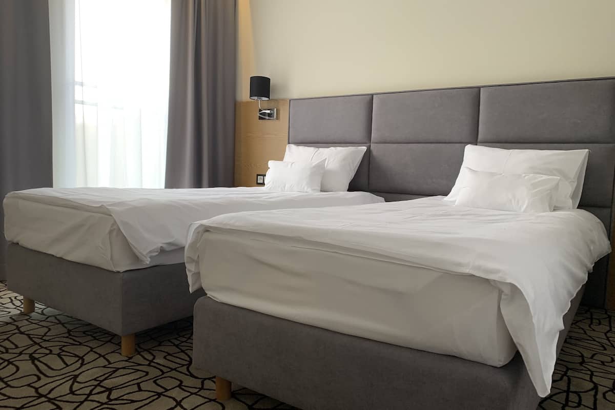 superior twin room | minibar, in-room safe, desk, soundproofing