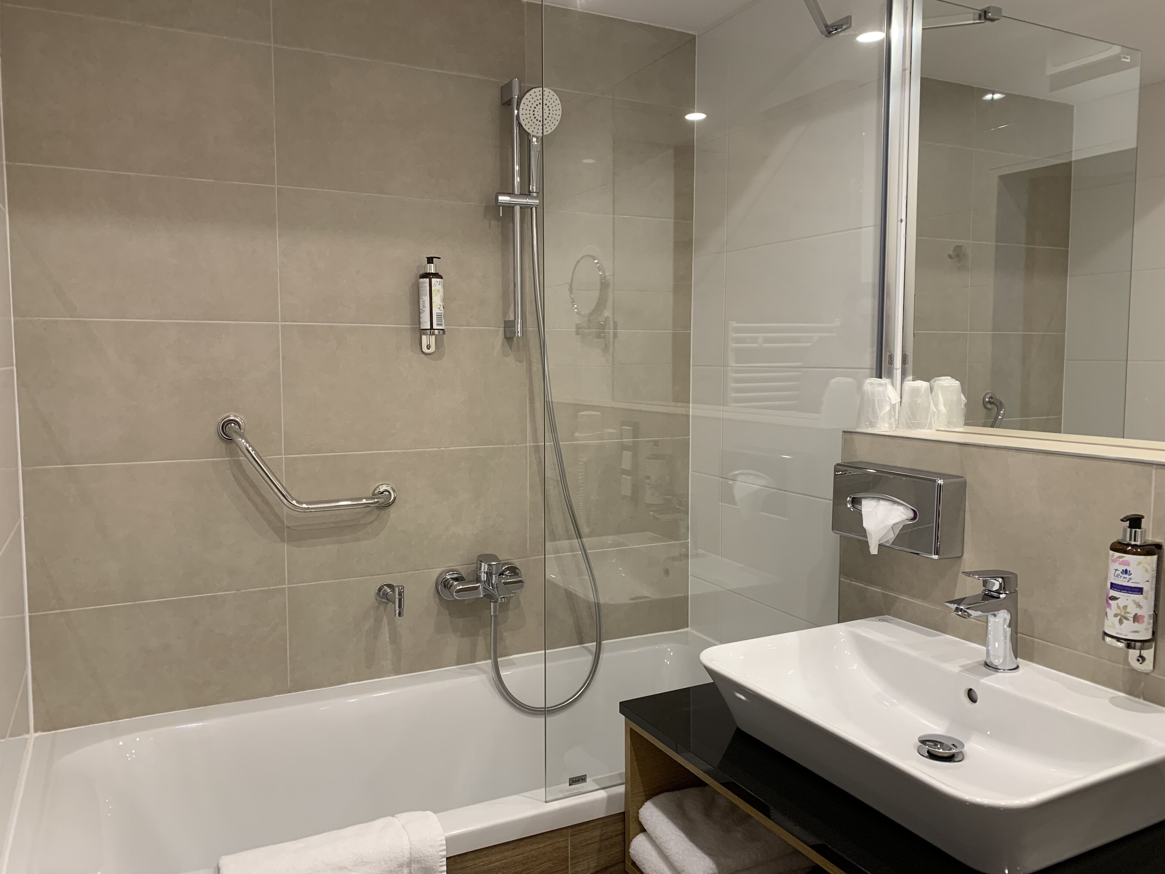 standard twin room | bathroom | designer toiletries, hair dryer, bathrobes, slippers