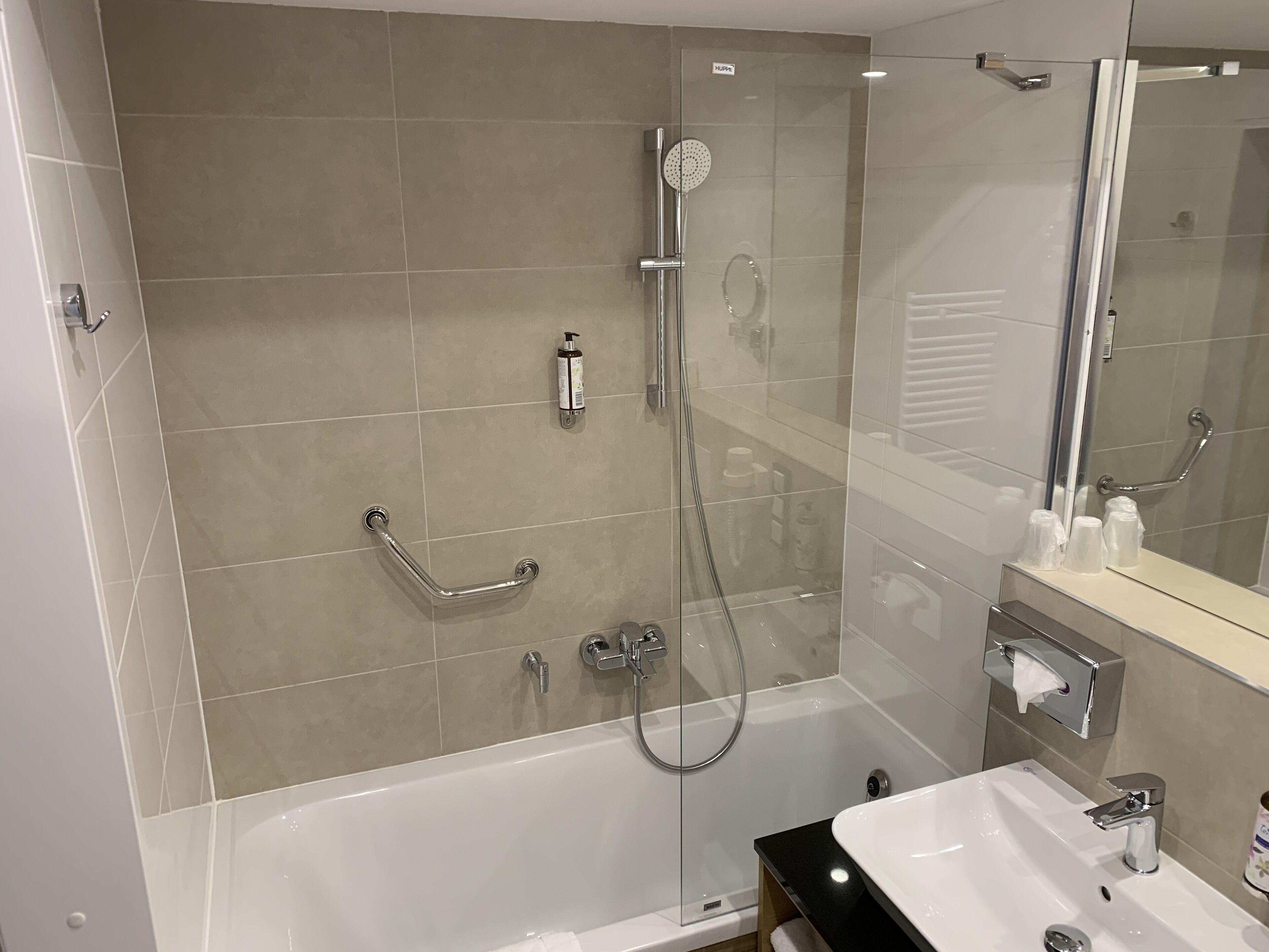 standard twin room | bathroom | designer toiletries, hair dryer, bathrobes, slippers