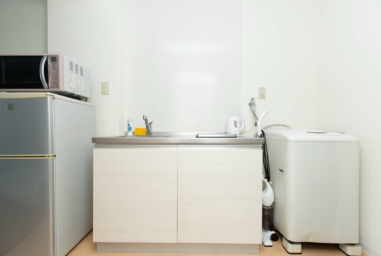 Family Room | Private kitchenette | Fridge, microwave, cookware/dishes/utensils