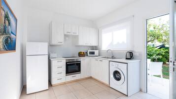 Townhouse Keluarga, 2 kamar tidur, Bebas Asap Rokok, pemandangan resor | Dapur pribadi | Lemari es, microwave, oven, dan kompor