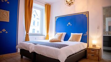 10 عدّة غرف نوم وأغطية فراش متميزة وأسرّة سليكت كومفورت ومكتب