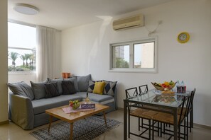 Family Apartment | Living room - Sweet Home At Hilton Beach 2BR (Tel Aviv)
