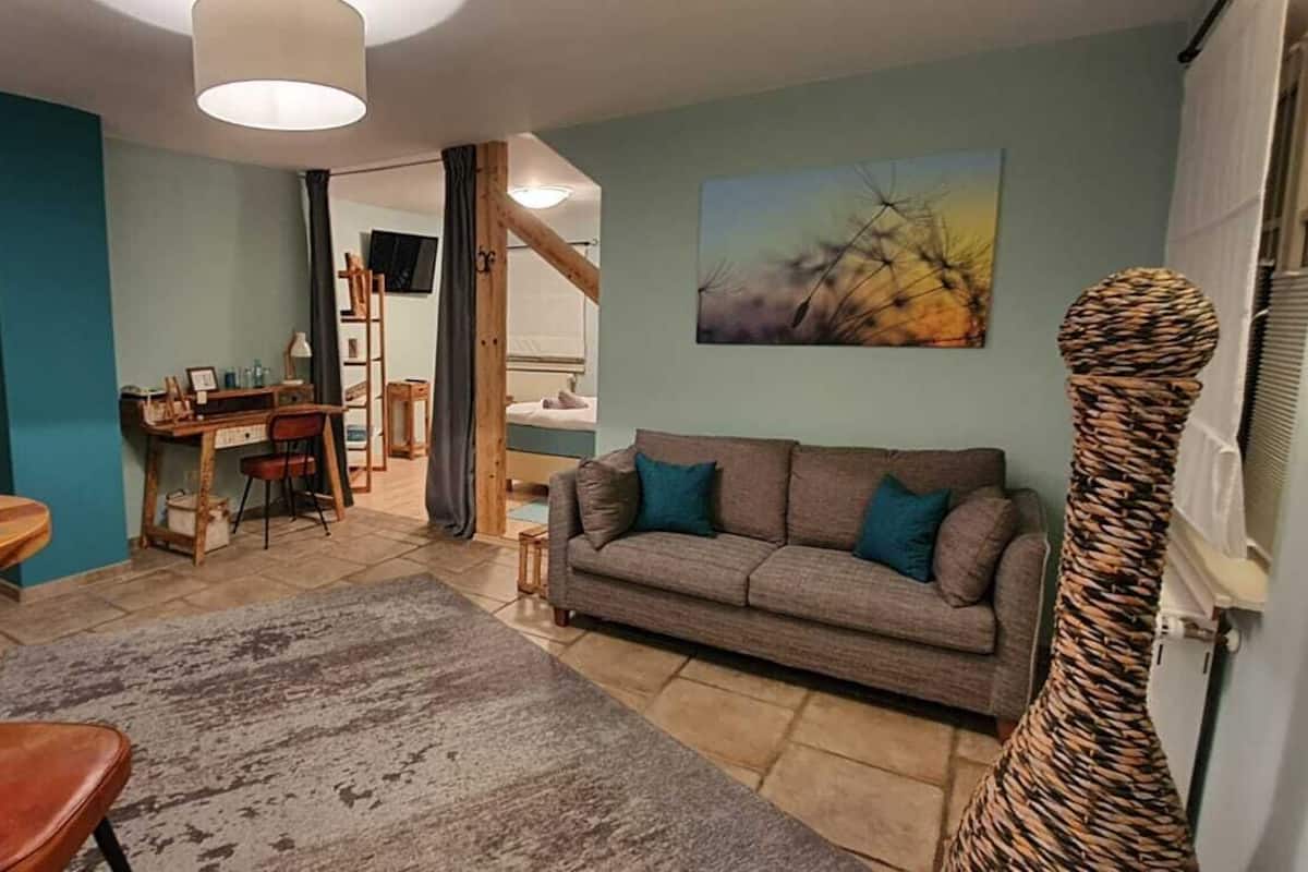 Junior Suite | Living area | Flat-screen TV