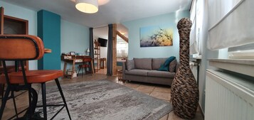 Junior Suite | Living area | Flat-screen TV