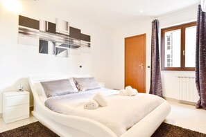 1 habitación, tabla de planchar con plancha, cuna de viaje y wifi 