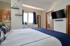 1 dormitorio, tabla de planchar con plancha, wifi