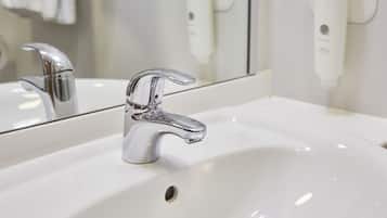 Combined shower/tub, hair dryer, towels, soap