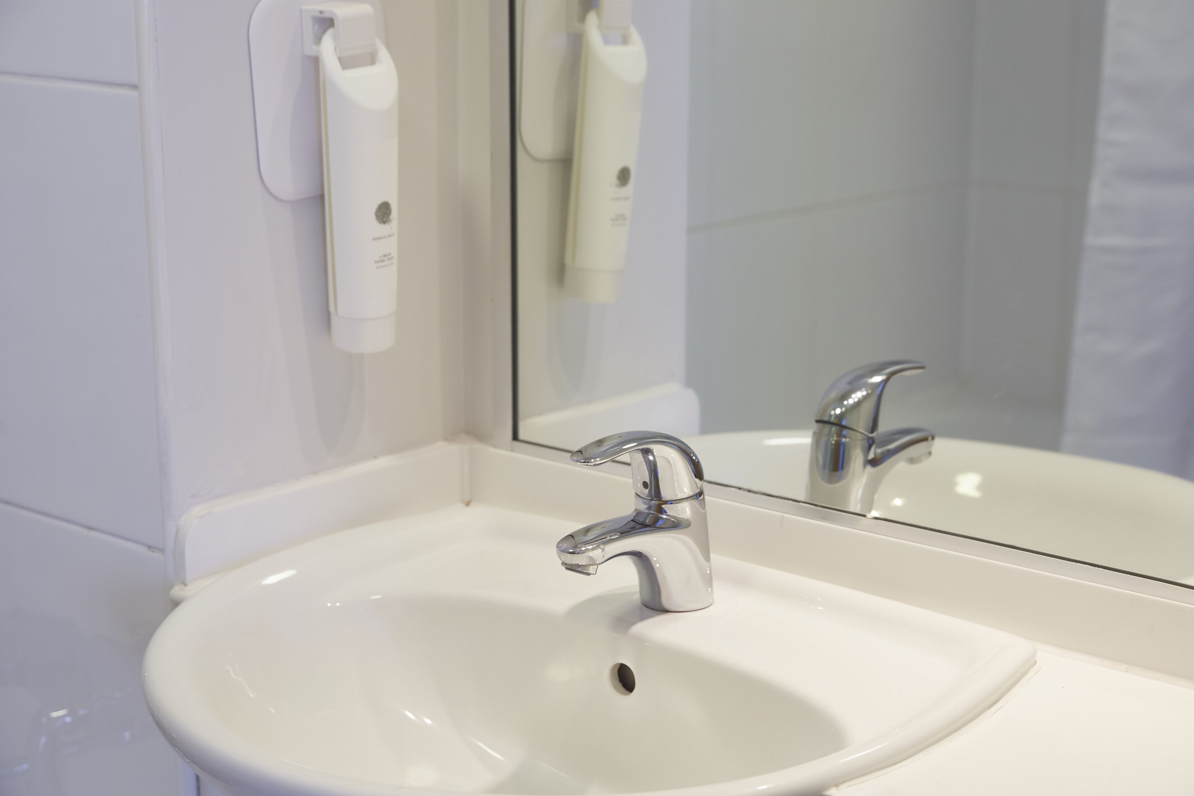 family room | bathroom | combined shower/bathtub, hair dryer, towels, soap