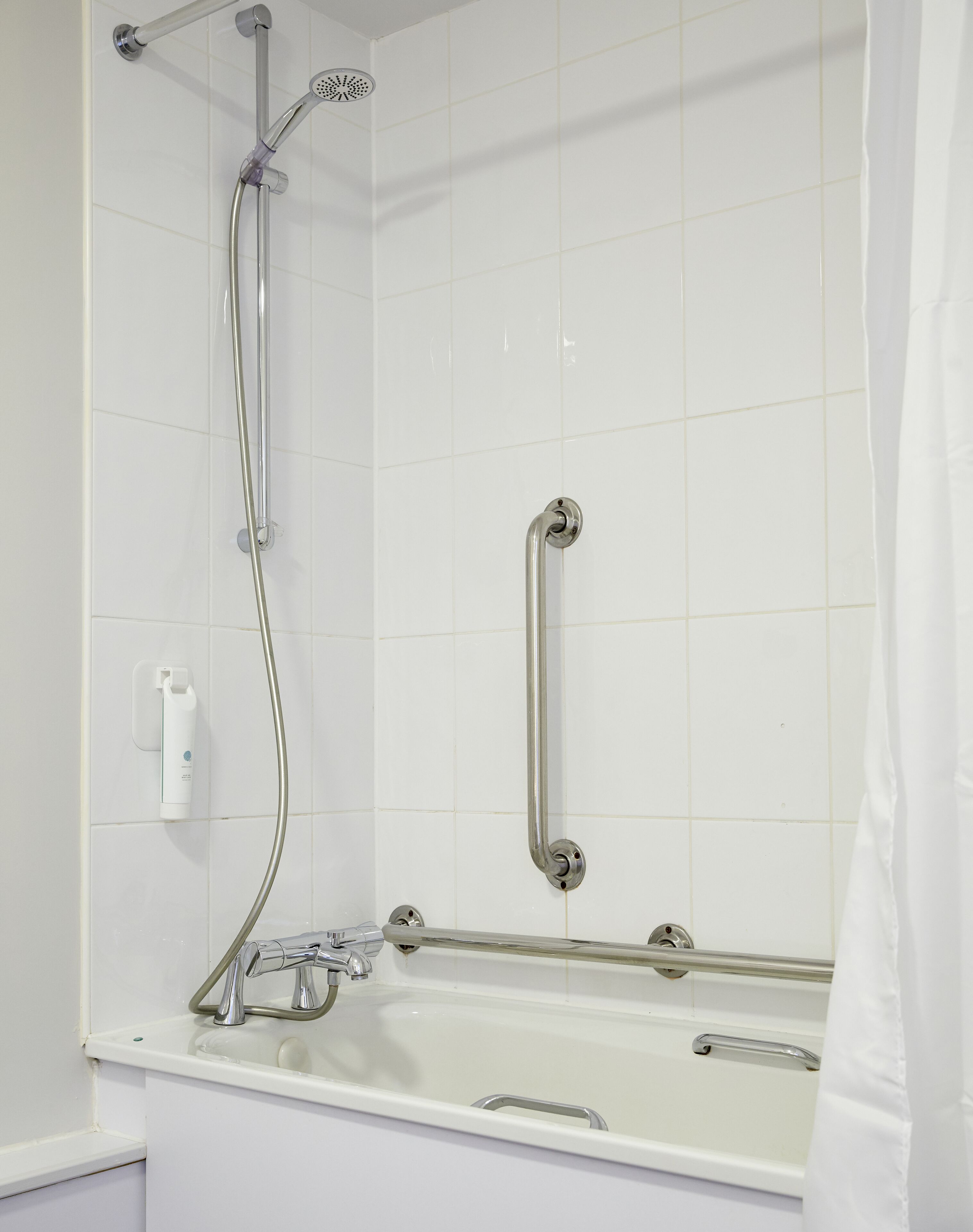combined shower/bathtub, hair dryer, towels, soap