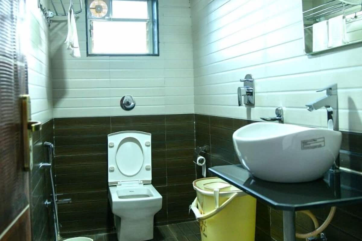 Gallery Villa | Bathroom | Shower, rainfall showerhead, bathrobes, slippers