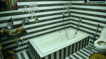 Deluxe Villa | Bathroom | Shower, rainfall showerhead, bathrobes, slippers