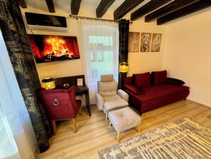 Estúdio luxo | Frigobar, escrivaninha, cortinas blackout, quartos à prova de som