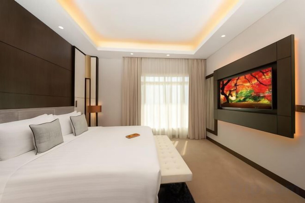 Premium bedding, down duvets, Select Comfort beds, minibar
