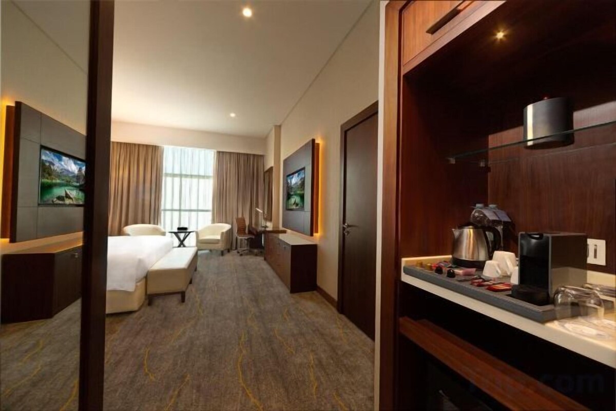 Premium bedding, down duvets, Select Comfort beds, minibar