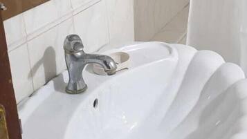 Apartment, 1 Bedroom | Bathroom | Shower, rainfall showerhead, towels