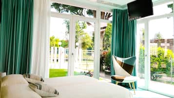 Double or Twin Room, Garden View | Minibar, in-room safe, blackout curtains, soundproofing