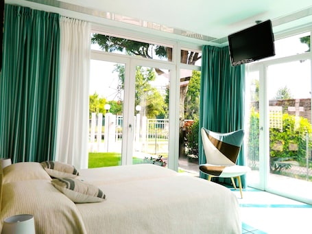 Doppel- oder Zweibettzimmer, Gartenblick | Minibar, Zimmersafe, Verdunkelungsvorhänge, schallisolierte Zimmer. Villa Marina